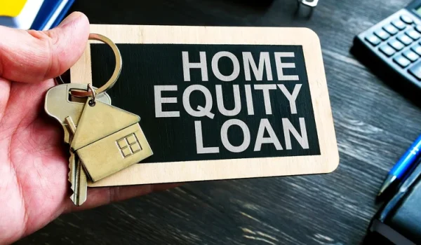 An image of a keychain with the words "home equity loan" on it.